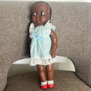 Vintage Brown Baby Doll with Light Blue Dress and Red Shoes